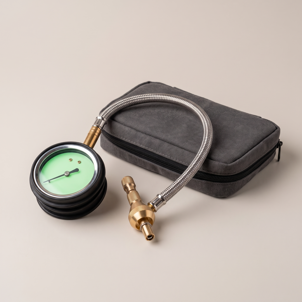 Tyre Deflator with Pressure Gauge & Stainless Braided Hose – studio three-quarter view