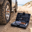 Tyre Puncture Repair Kit with Plugs, Tools & Gauge – in use at a sandy beach 4WD track with dunes in bright daylight